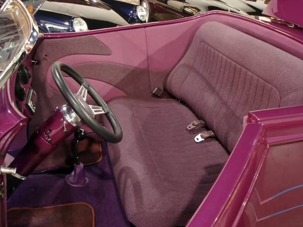 Custom cloth interior, reclining seat, retractable belts