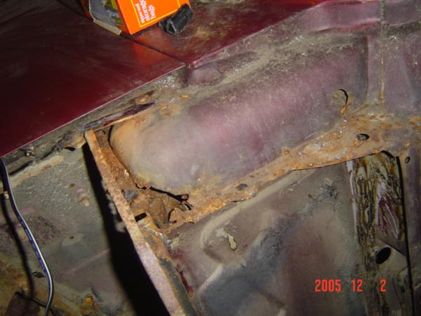 Behind driver side fender