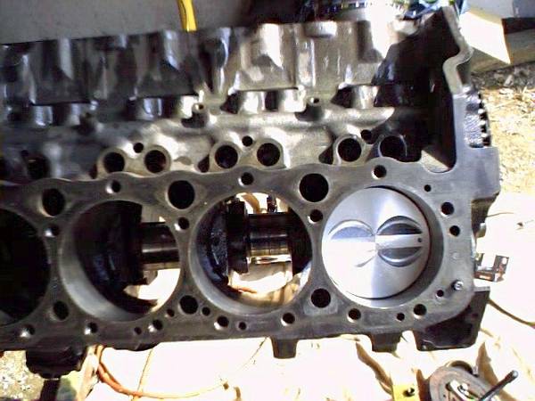 INSTALLING THE NEW PISTONS